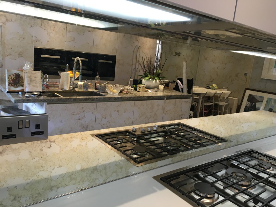 Mirror glass splashback in Harlesden luxury kitchen