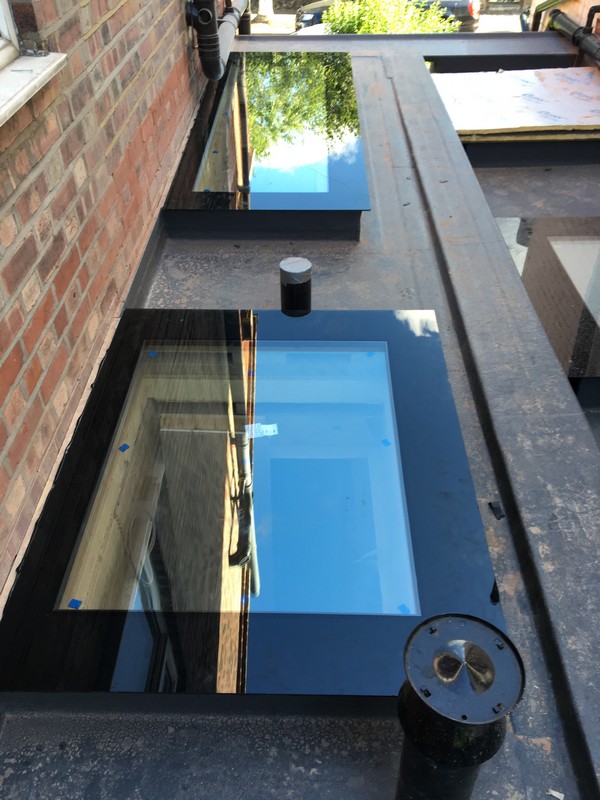 Multiple flat roof skylights on extension in Harlesden